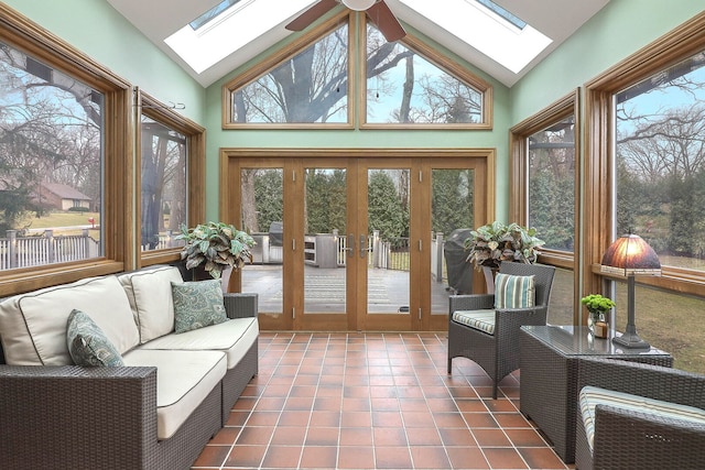 sunroom with french doors and a skylight
