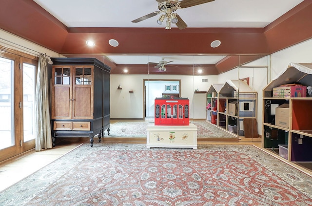 rec room with plenty of natural light and a ceiling fan