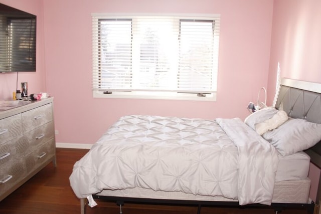 bedroom featuring hardwood / wood-style floors