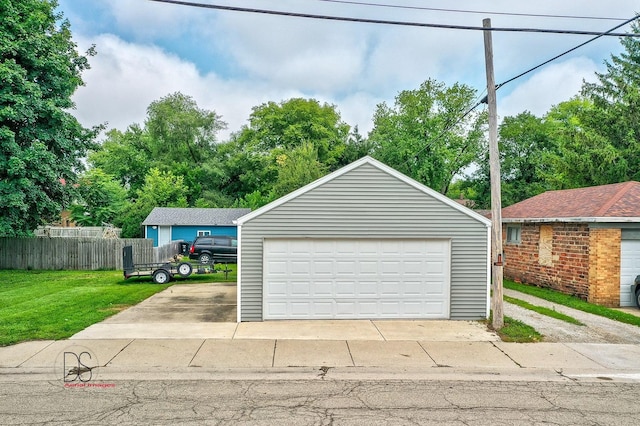 garage featuring a yard