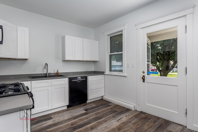 kitchen featuring dishwasher, white cabinets, and sink