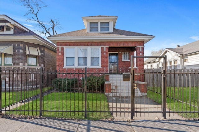 bungalow featuring a front yard