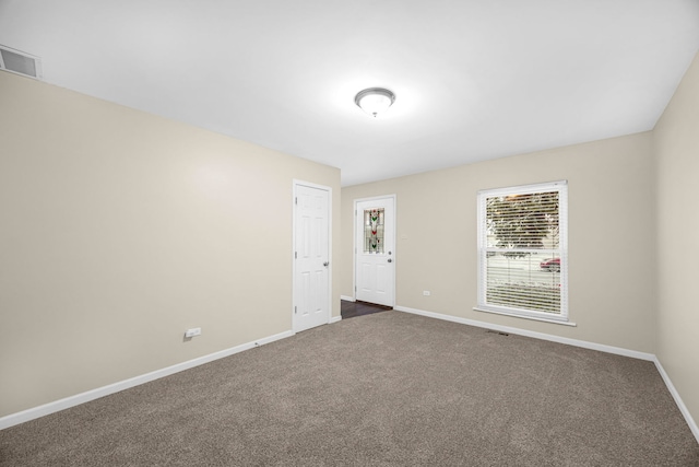 unfurnished room with carpet