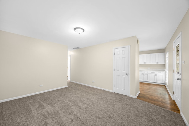 unfurnished room featuring hardwood / wood-style floors