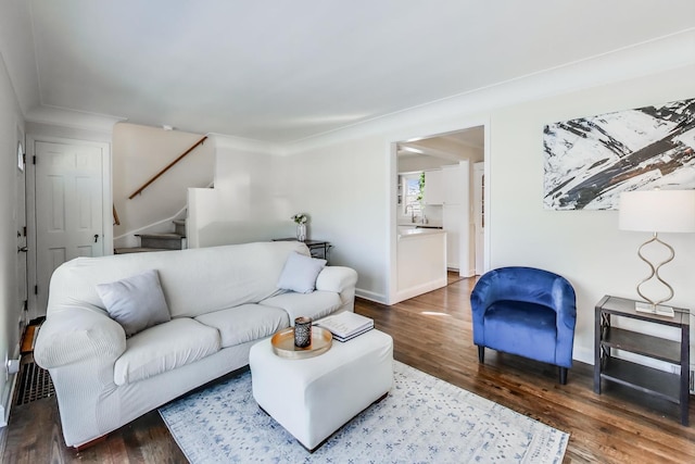 living room with dark hardwood / wood-style flooring