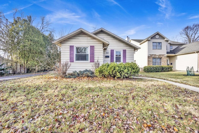 view of front of home with a front yard