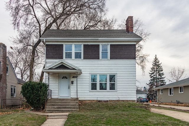 view of front of property with a front yard