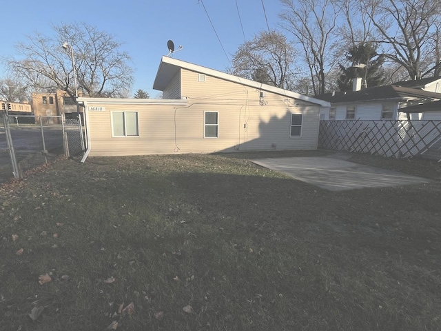 rear view of property with a patio area