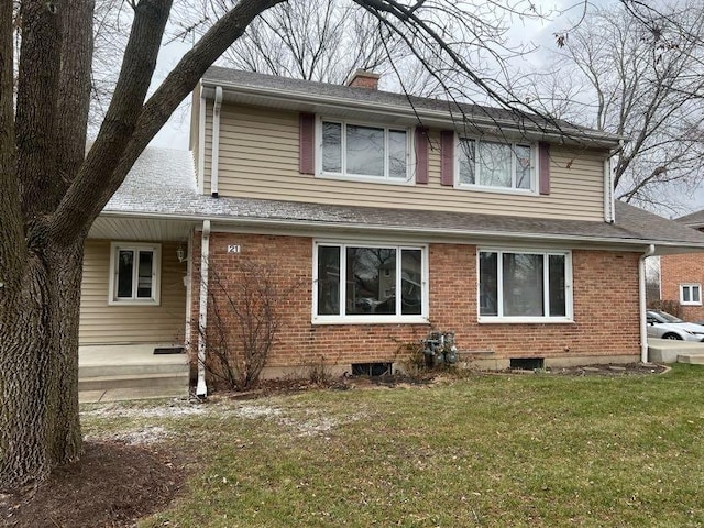 view of front facade featuring a front yard