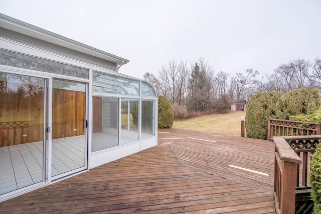 wooden terrace with a sunroom