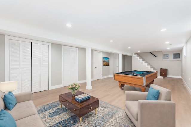 rec room with light hardwood / wood-style flooring and pool table