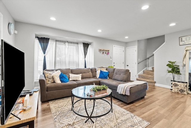 living room with light hardwood / wood-style floors