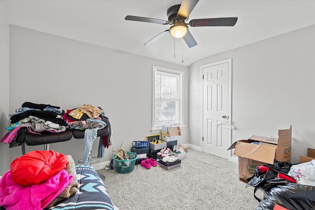 carpeted bedroom with ceiling fan