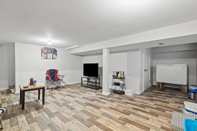 basement with light wood-type flooring