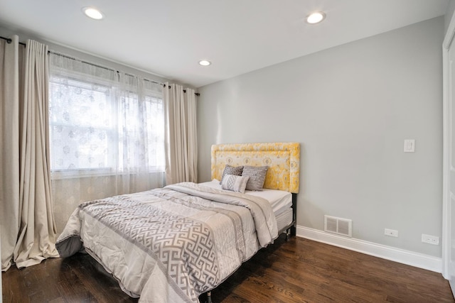 bedroom featuring dark wood-type flooring