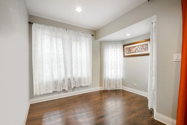 empty room featuring dark hardwood / wood-style floors