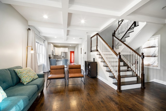 living room featuring beam ceiling, dark hardwood / wood-style floors, and coffered ceiling