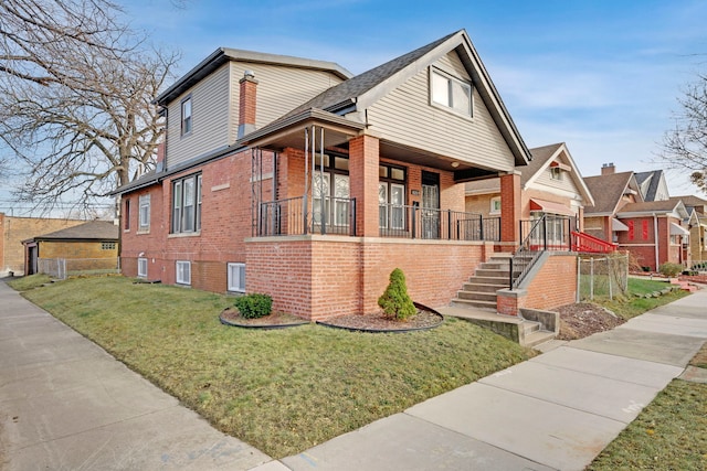 view of front of home featuring a porch and a front yard