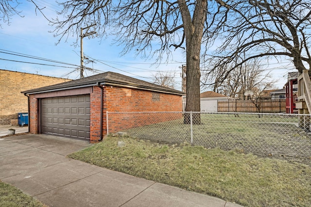 garage with a lawn