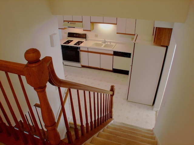 staircase featuring sink