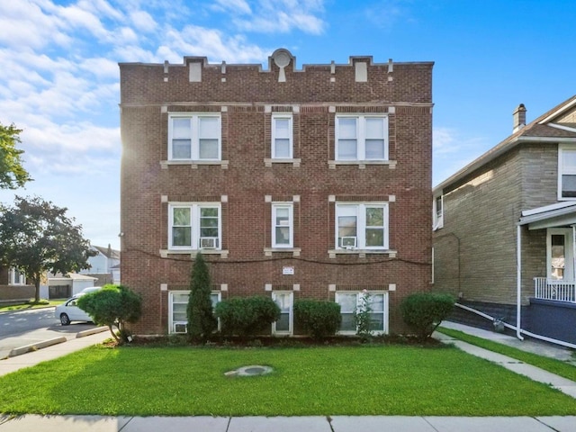 view of front of home with a front yard