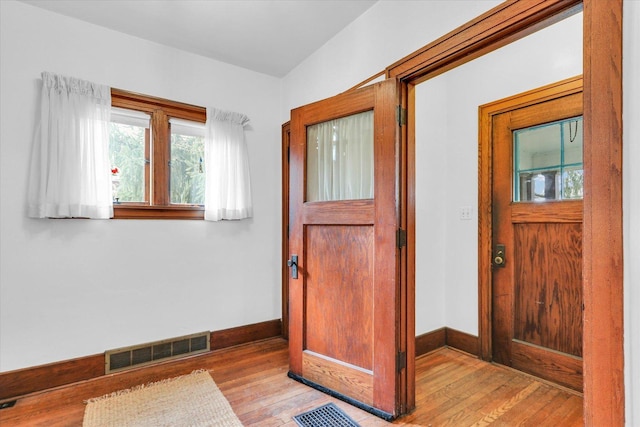 entrance foyer featuring light wood-type flooring