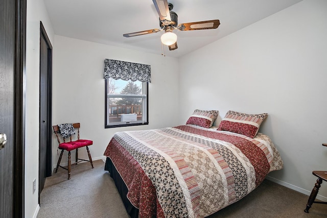 bedroom with ceiling fan and carpet floors