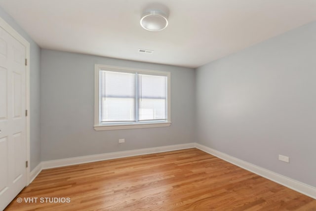 empty room featuring light hardwood / wood-style floors