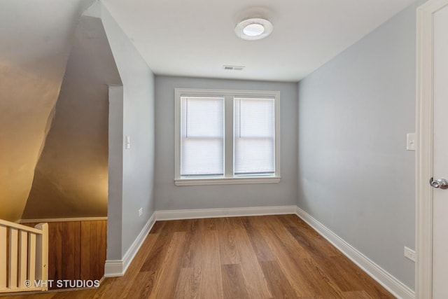 bonus room with hardwood / wood-style flooring