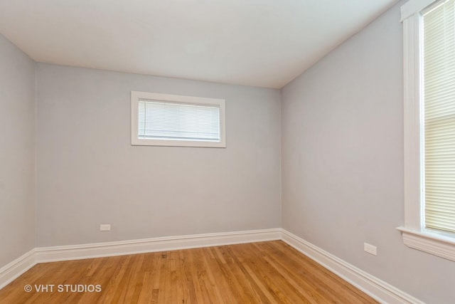 empty room featuring wood-type flooring