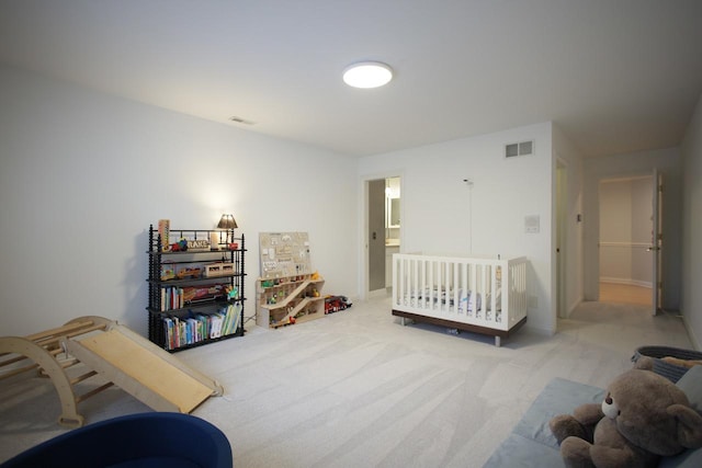 bedroom with light colored carpet