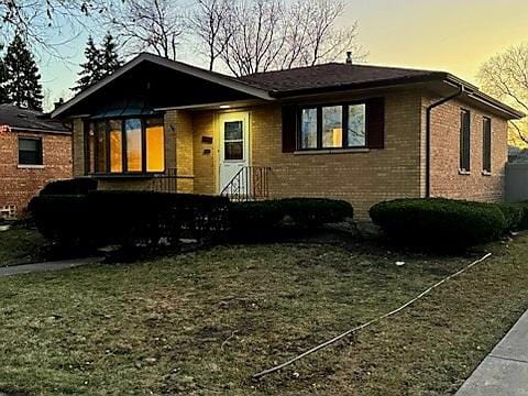 10016 Minnick Ave, Oak Lawn, IL 60453 - single story home featuring brick siding