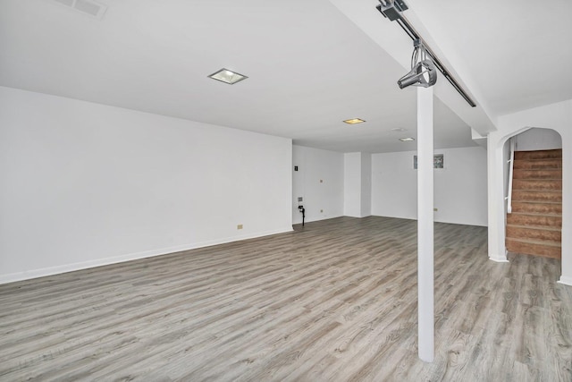 10016 Minnick Ave, Oak Lawn, IL 60453 - unfurnished living room featuring wood finished floors and stairway