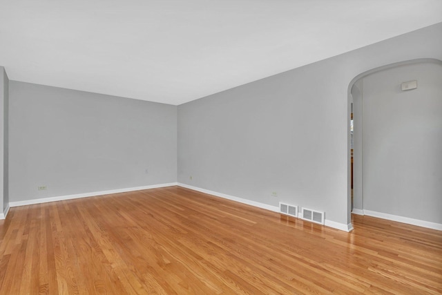 unfurnished room featuring light hardwood / wood-style floors