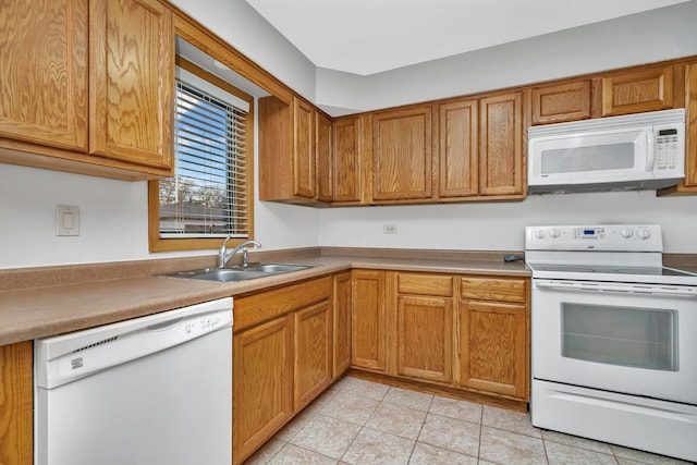 10016 Minnick Ave, Oak Lawn, IL 60453 - kitchen with white appliances, light tile patterned floors, and brown cabinets