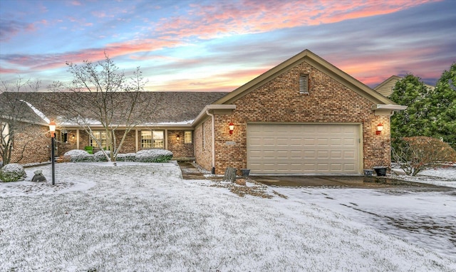 single story home with a garage