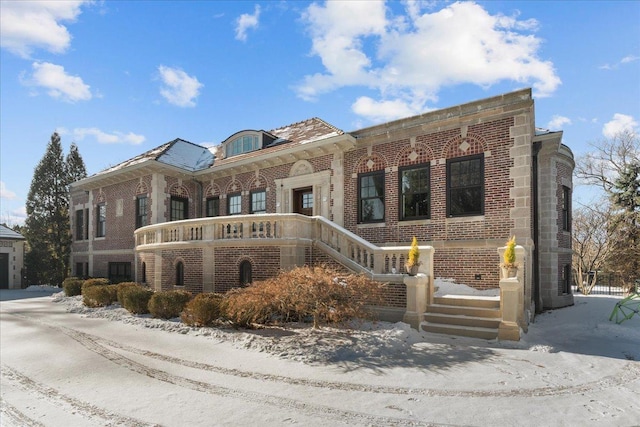 view of snow covered property