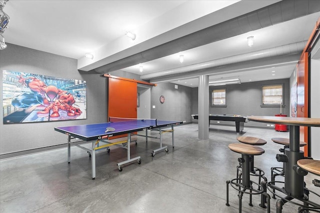 playroom with concrete flooring