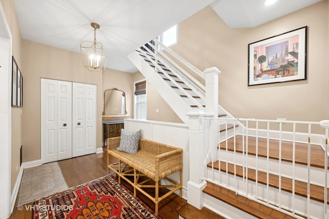 interior space with hardwood / wood-style floors and a chandelier