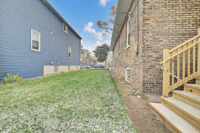 view of home's exterior featuring a yard