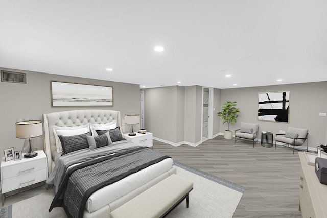 bedroom featuring light hardwood / wood-style floors