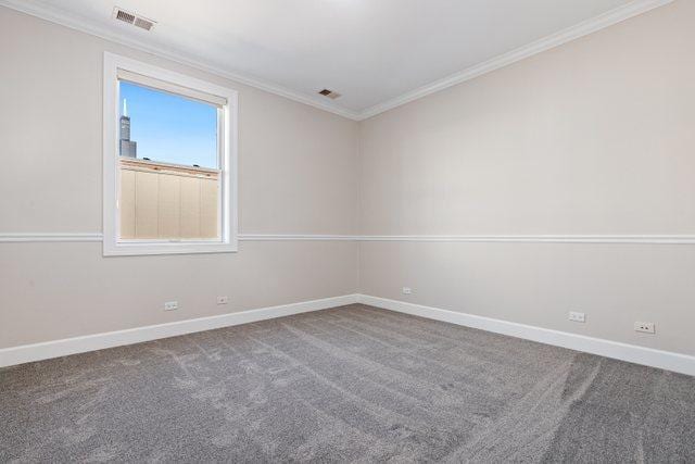 carpeted empty room with ornamental molding