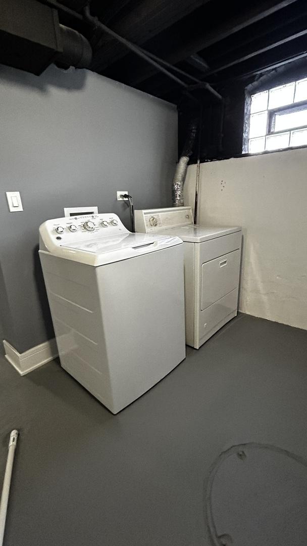 laundry room with separate washer and dryer