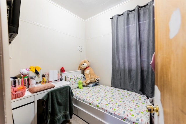 bedroom featuring ornamental molding