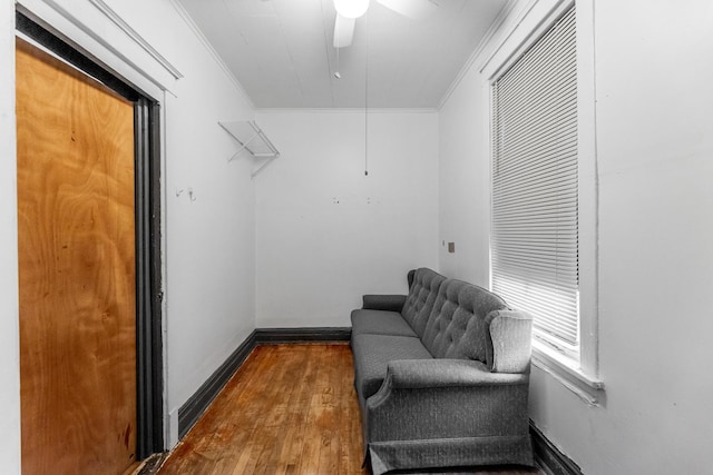 spacious closet with hardwood / wood-style floors and ceiling fan