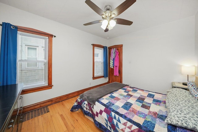 bedroom featuring wood-type flooring and ceiling fan