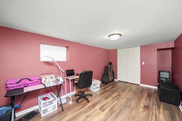 office space with hardwood / wood-style floors