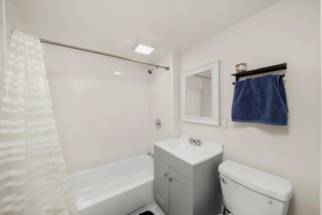 full bathroom featuring vanity, shower / bath combination with curtain, and toilet