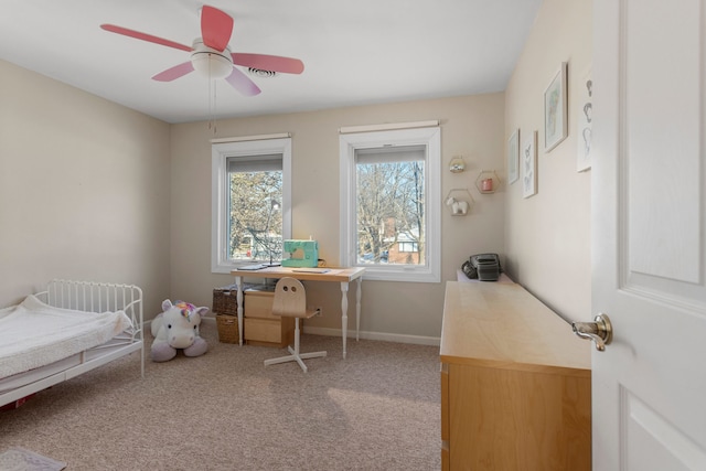 carpeted bedroom featuring ceiling fan