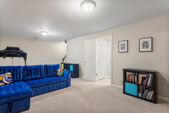 living room featuring light carpet